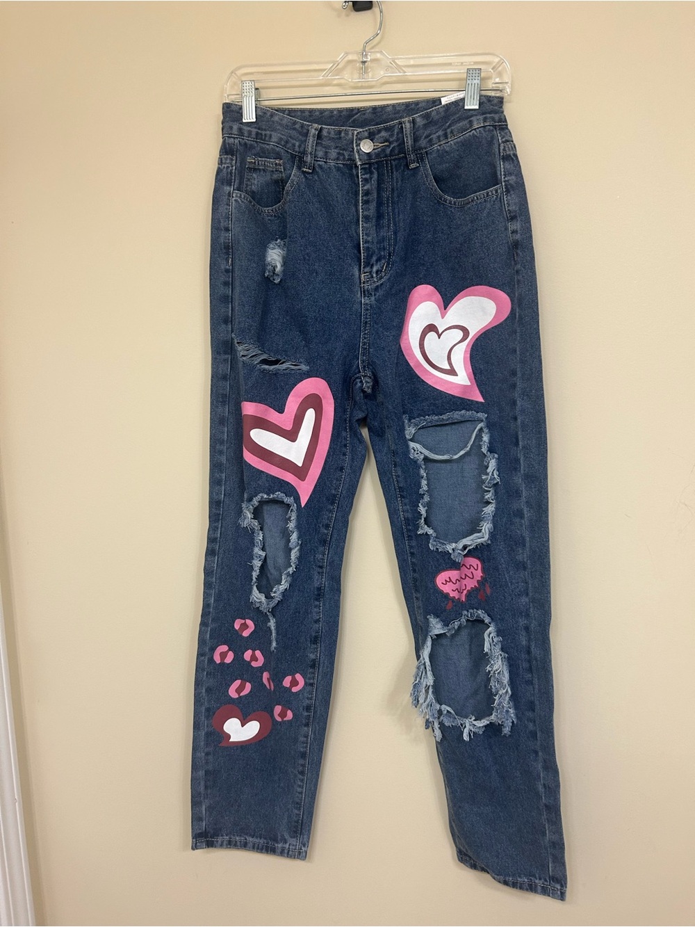 Heart patch ripped jeans